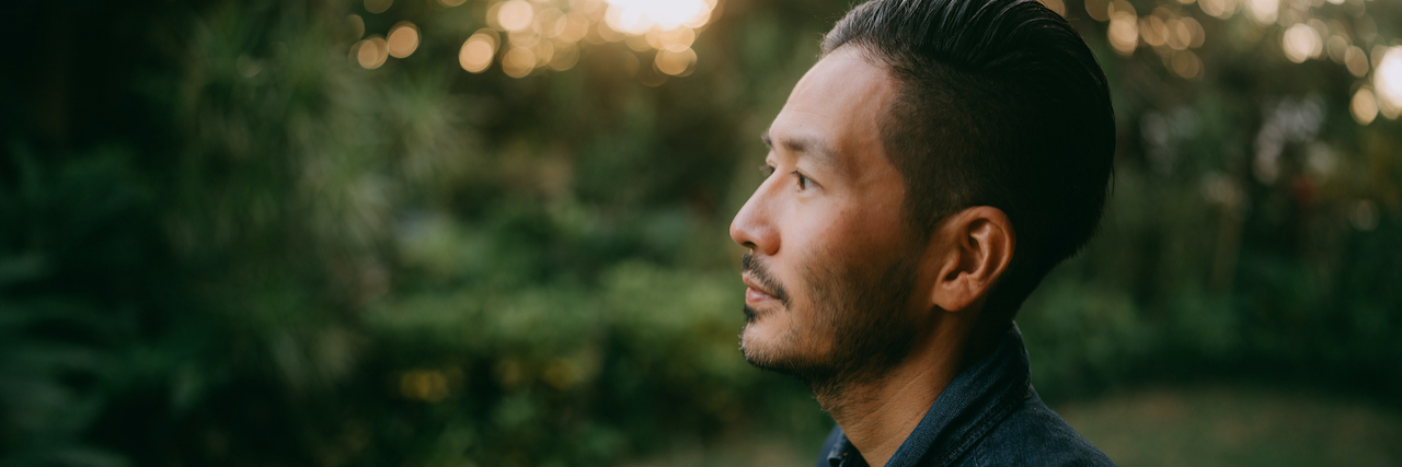 The Connection Between Epilepsy and Memory Loss Portrait of Asian man outside in nature