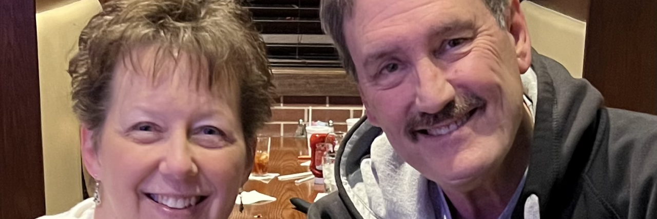 A Reality Check About Life With Cancer Contributor Keith T. Hardeman and his wife Shelley smiling in a restaurant