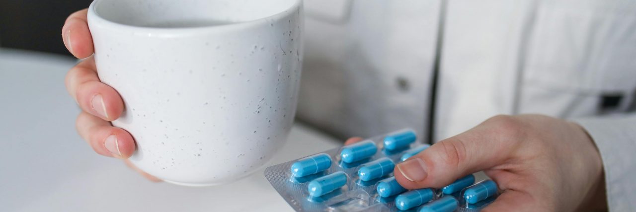 hand of pills
