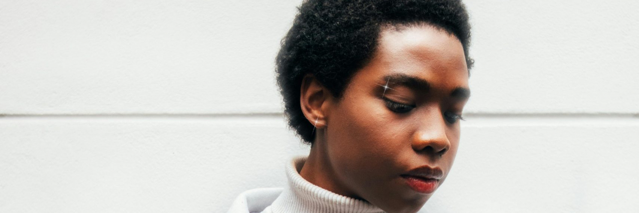 Unknown Signs of Autism person holding flowers