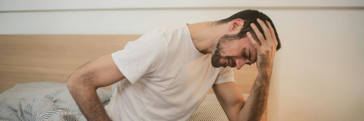 man with migraine