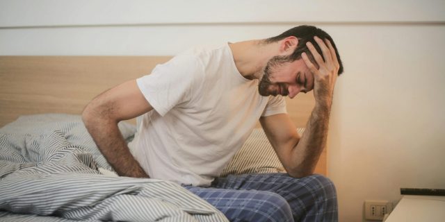 man with migraine