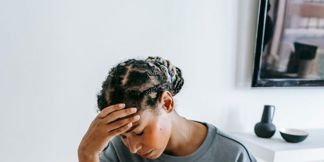 What Is Cephalalgia? person with headache