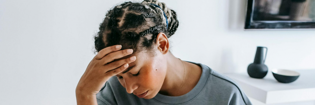 What Is Cephalalgia? person with headache