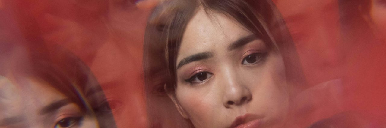 What Is Histrionic Personality Disorder? A Comprehensive Guide multiple faces in red fog