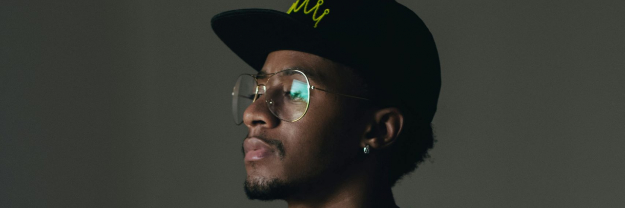 'Weird' Early MS Signs person standing and looking away