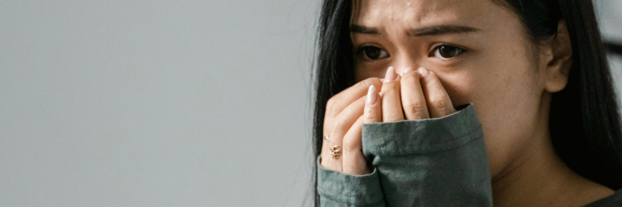 Signs of Migraine Anxiety anxious person