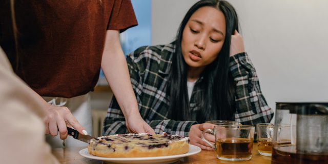 person being served dessert