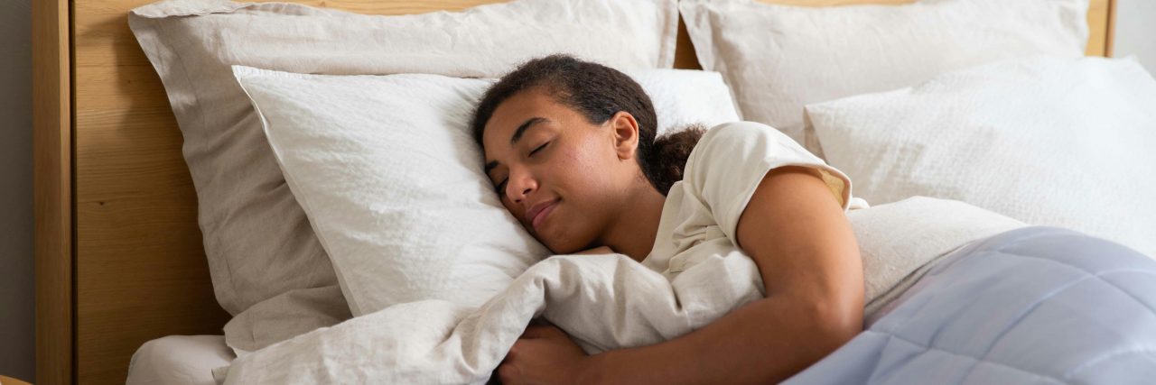 What Is Biphasic Sleep? A Complete Guide sleeping person