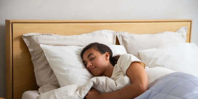 What Is Biphasic Sleep? A Complete Guide sleeping person