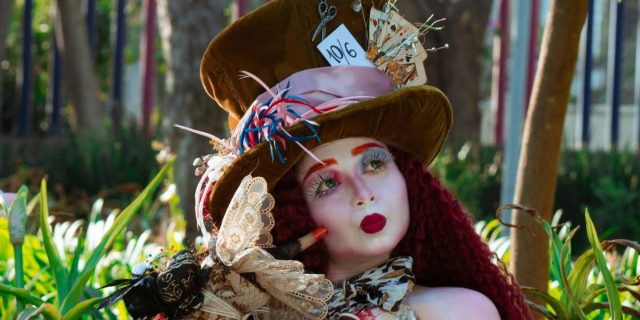 woman dressed as the mad hatter from alice in wonderland
