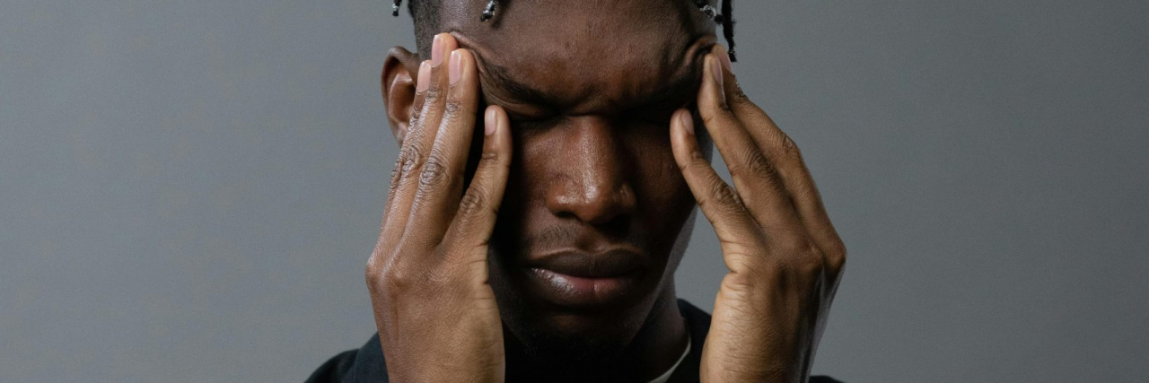man with migraine