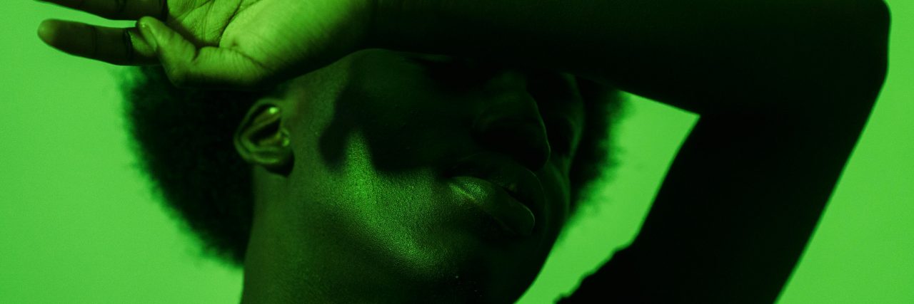 What Is Status Migrainosus? person with headache