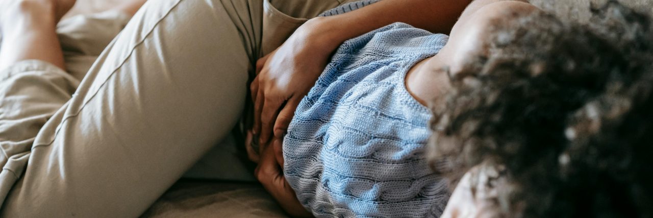 Adenomyosis Signs person with menstrual cramps