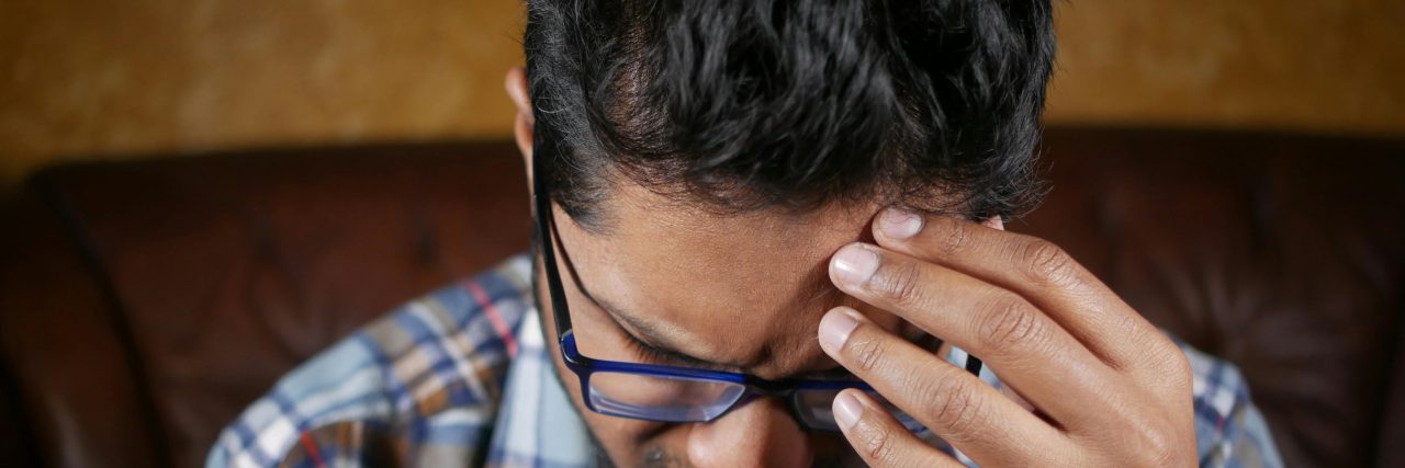 Migraine vs. Trigeminal Neuralgia man with headache