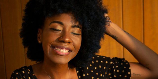 What Is AuDHD? smiling woman