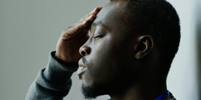 man with headache
