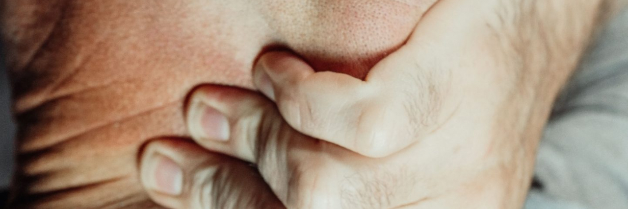 person with a neck headache