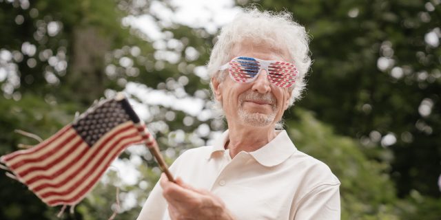 older woman celebrating the fourth of july outside