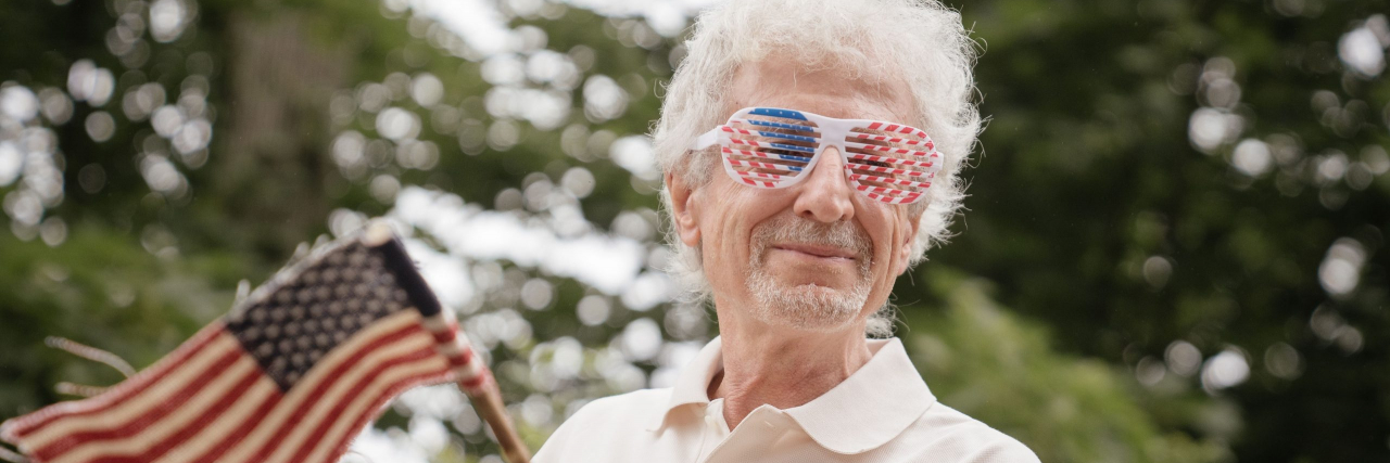 older woman celebrating the fourth of july outside