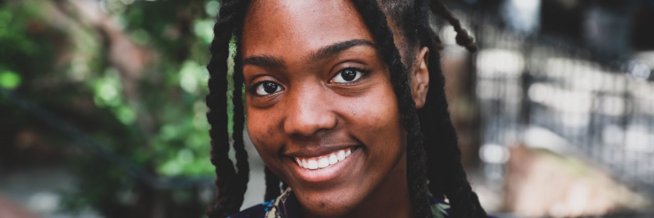 15 Common Signs of AuDHD: Understanding the Overlap of Autism and ADHD smiling person