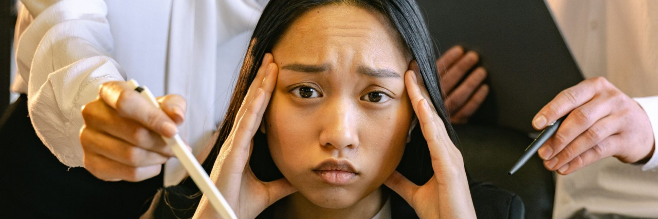 stressed woman being asked to do a lot of work