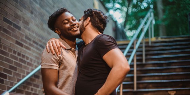 Signs of Relationship OCD (ROCD): What Research Actually Shows couple kissing on the stairs