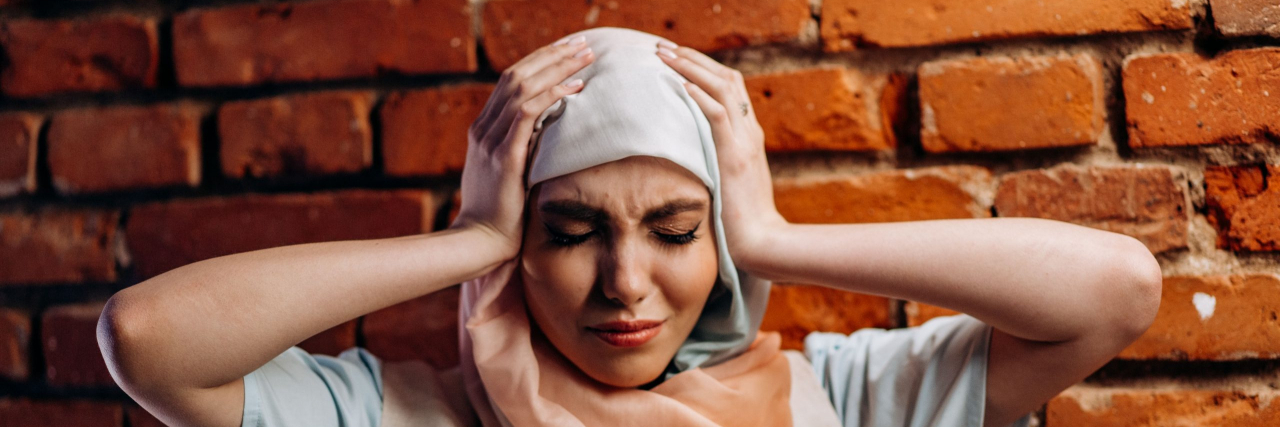 person with headache