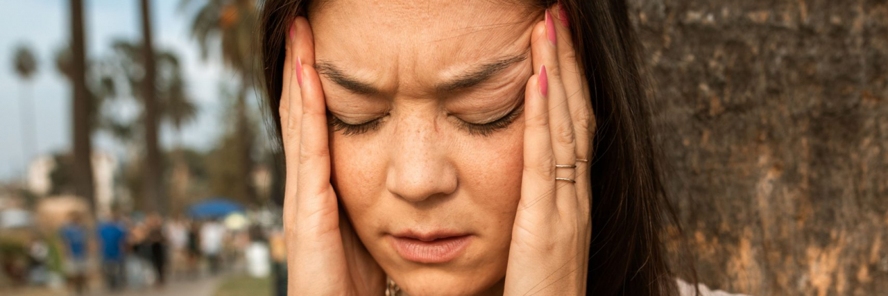 What Is a Scintillating Scotoma? person with migraine
