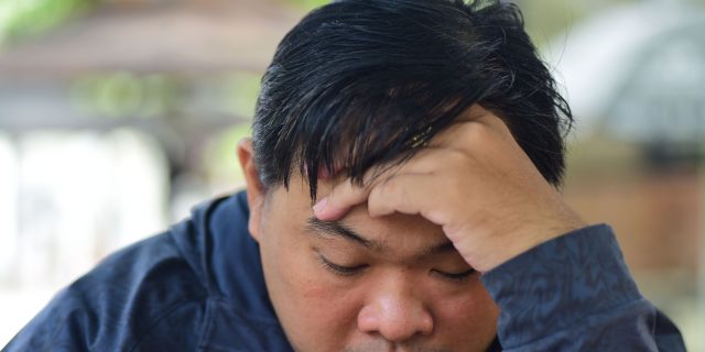 person with headache