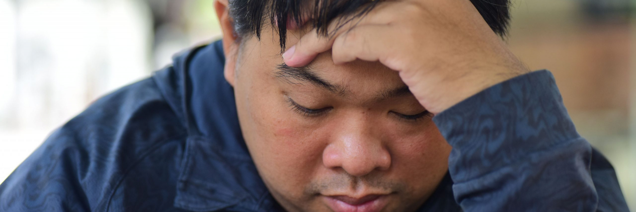 person with headache