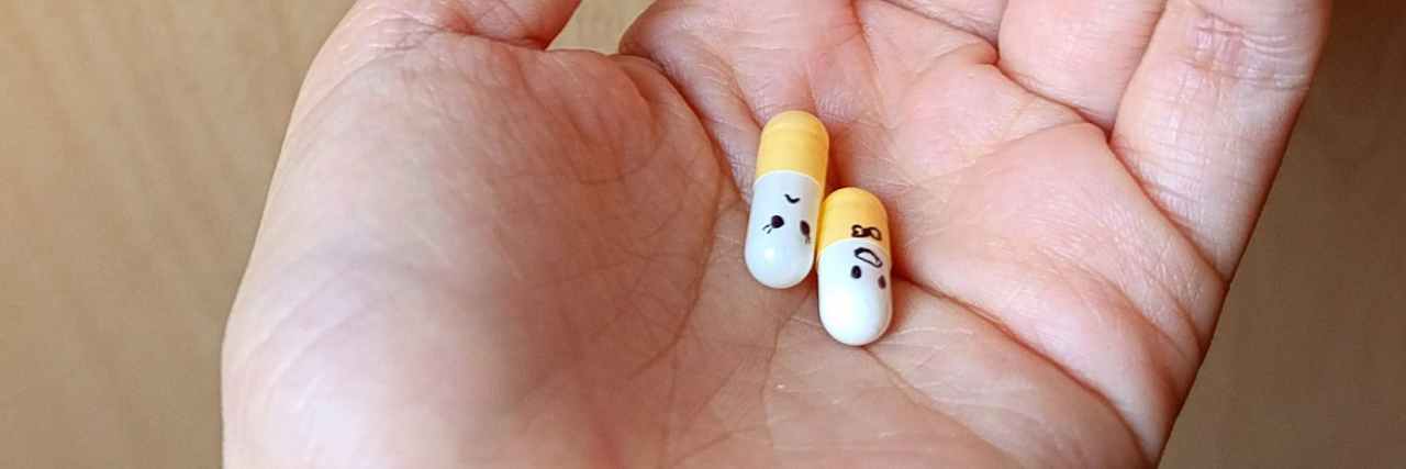 hand holding antidepressants