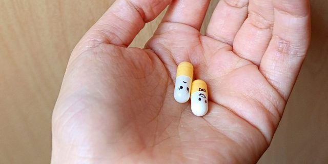 hand holding antidepressants