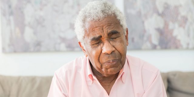 old person looking confused at their phone