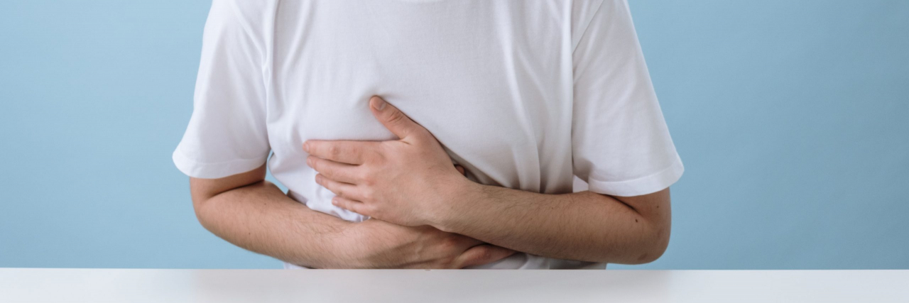 person with torso pain